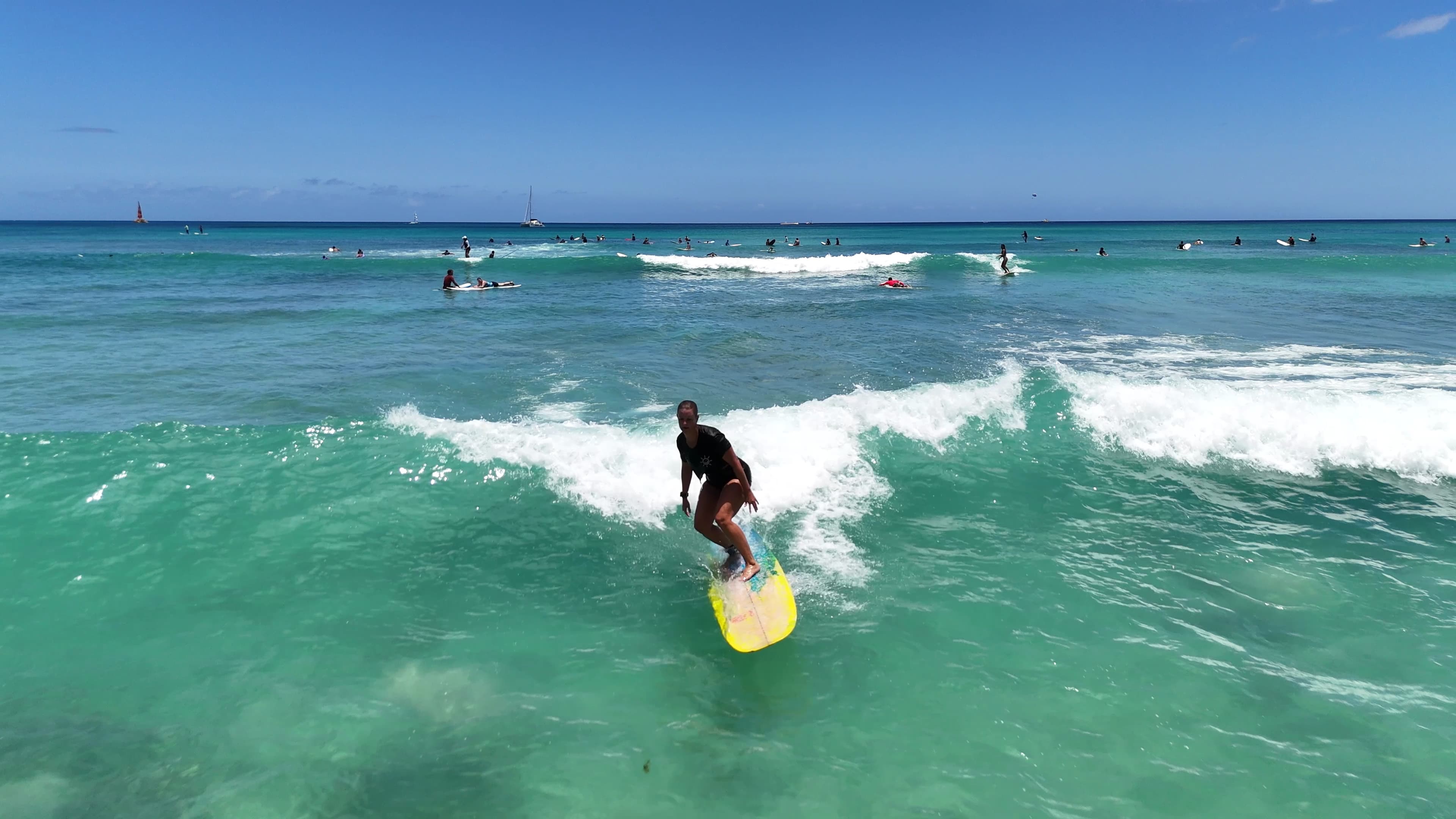 Kelli surfing in Hawaii